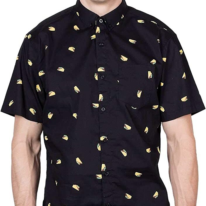Man wearing black short sleeve button down shirt with small taco print pattern.